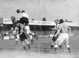 Joe Payne rises highest watched by Jack Ball