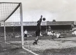 The Northampton goalkeeper saves this one