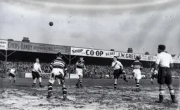 The ball flies over the bar