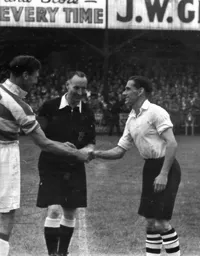 Skipper Doug Gardiner greets his Rangers counterpart