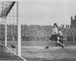 Wally Shanks (in dark shirt) nets the only goal of the game
