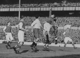 Iorwerth Hughes tips the ball over