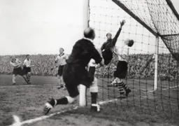 Iorwerth Hughes fingertips the ball to safety