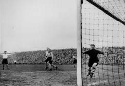 Iorwerth Hughes watches as the ball creeps into the net