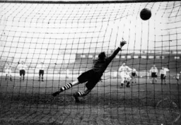 Iorwerth Hughes is beaten from the spot by City's late leveller