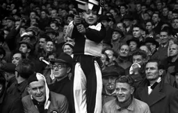 Easy to see who this young fella supports. No doubt making loads of noise with his rattle