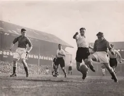 Bob Morton gets in a tackle
