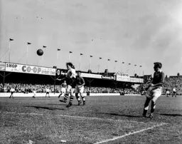 Johnny Downie makes an attacking header