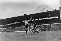 Joe Scott puts in a strong challenge on Johnny Anderson