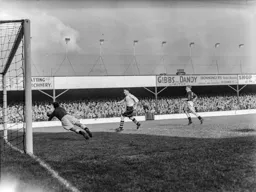 Ian Black makes a save as Johnny Downie follows up