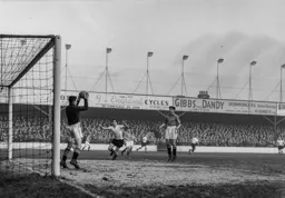 Ken Hardwick catches the ball as Bob Morton hopes for any mistake
