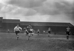 Roy Davies in a chase for the ball