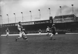 Its up there somewhere. Bernard Streten looks to the heavens in search of the ball