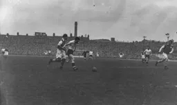 Gordon Turner advances into the penalty area