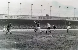 A view from the opposite side as Mike Cullen scortes the Town`s first goal
