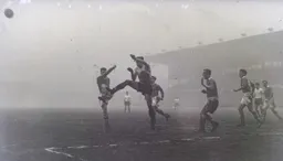 Bob Morton goes in with a high boot but the ball is cleared