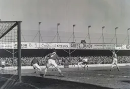 Ian Black manages to block this shot by Roy Davies