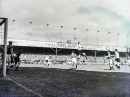 John Groves soars above Malcolm Allison but the ball is too high