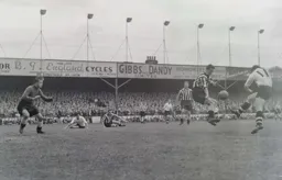 Jimmy Adam tries a shot from close range