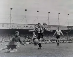 Peter MacEwan looks on as John Thompson prepares to make a save