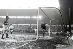 Gordon Turner watches the ball flash across the Everton goalmouth