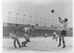 John Groves heads the ball across the goal