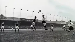 Tony Gregory goes up for a high ball