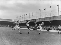 Gordon Turner and Peter Farrell get involved in some high kicking