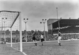 Mick Cullen and Jimmy O`Neill watch the flight of the ball