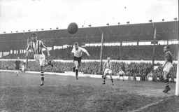 The photographer is in danger as this header by Tony Gregory heads his way