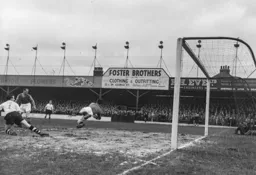 Mick Cullen`s close range header is saved by Nigel Sims