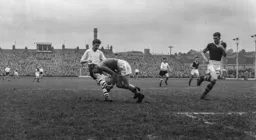 Colin McDonald grabs the ball off the foot of George McLeod