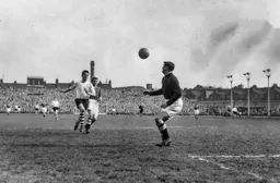 John Groves chases the ball but it sails harmlessly through to Bill Robertson