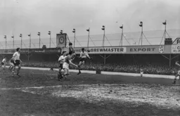 John Groves gets his head to the ball