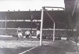 Nigel Sims makes a safe catch before George McLeod can cause a problem