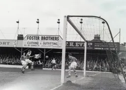 John Groves directs a header towards the goal
