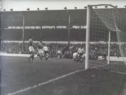 No joy here for Gordon Turner as Leeds keeper Roy Wood blocks his attempt at goal
