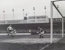 Jimmy Adam`s cross is just too high for Tony Gregory