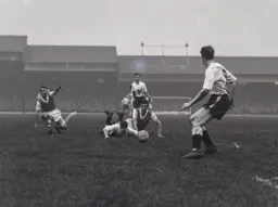 Jimmy Adam is flattened by Jim Fotheringham`s challenge