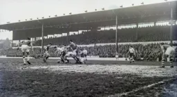 Allan Brown tries to get on the ball but is surrounded by five City defenders