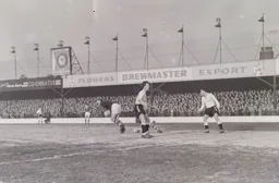 Billy Bingham looks in one direction but the keeper has hold of the ball and goes in the other direction