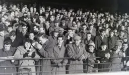 These supporters in the Bobbers Stand are well wrapped up against the cold wind and sub zero temperatures