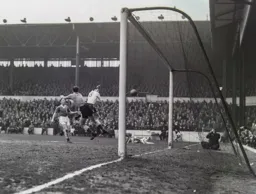 Allan Brown gets in front of City keeper Dave MacLaren to head in Town`s second goal