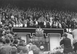 A sad Syd Owen is consoled by the Queen at the end of the game