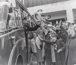 Supporters wave goodbye