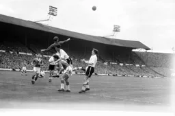Forest keeper Chick Thomson punches clear