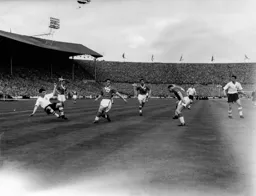 George Cummins gets the ball across