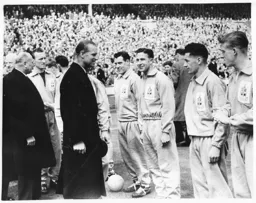 HRH Prince Phillip is introduced to the team