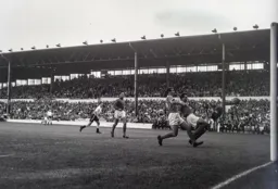 Blackpool's Jimmy Armfield clears the ball off the line