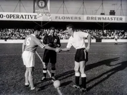 Skipper for the day John Groves greets his Blackpool counterpart Hugh Kelly